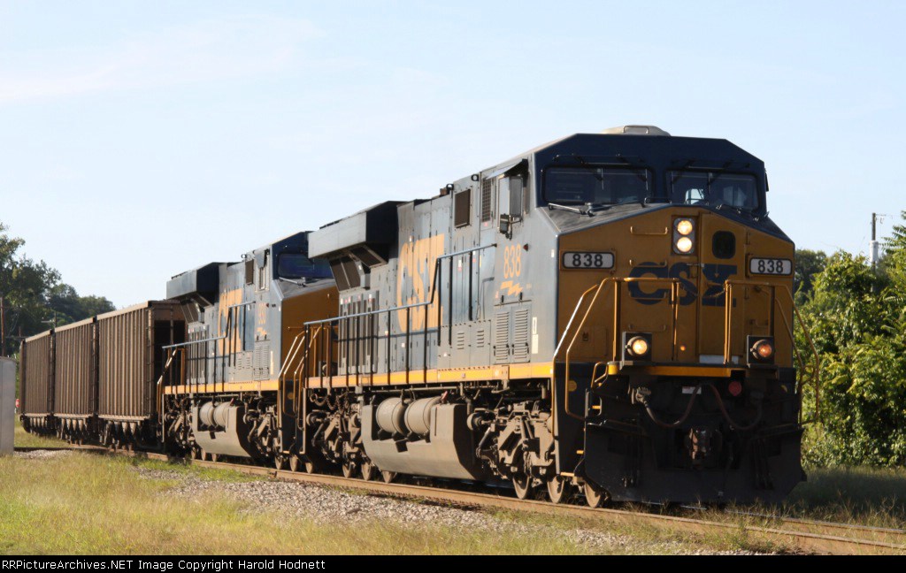 CSX 838 leads train U355-30 across the diamonds